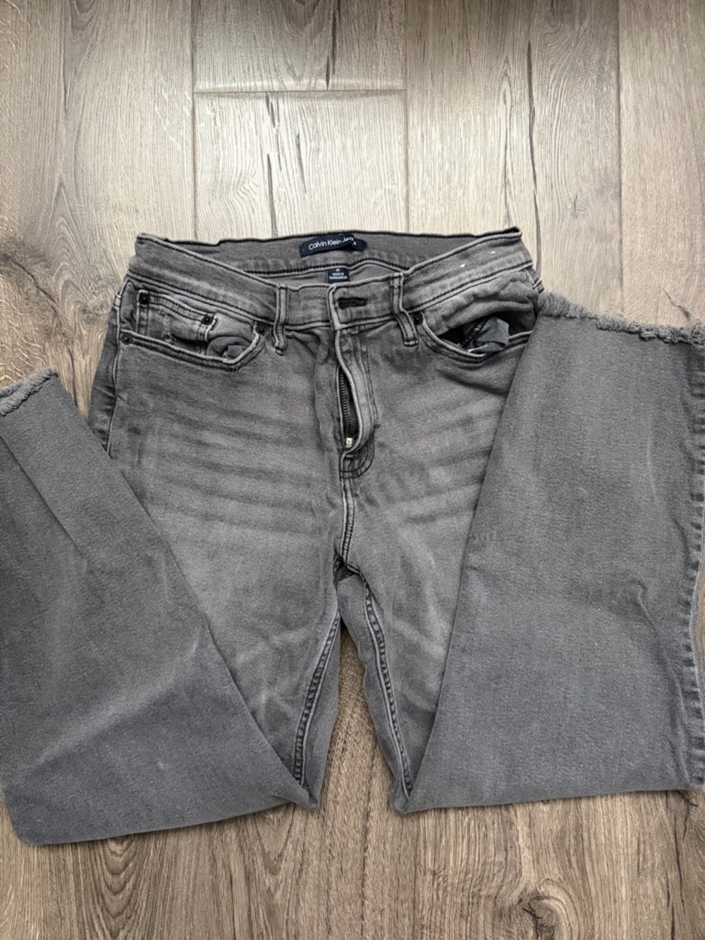 Calvin Klein Washed Gray Straight-Leg Jeans with Frayed Hem